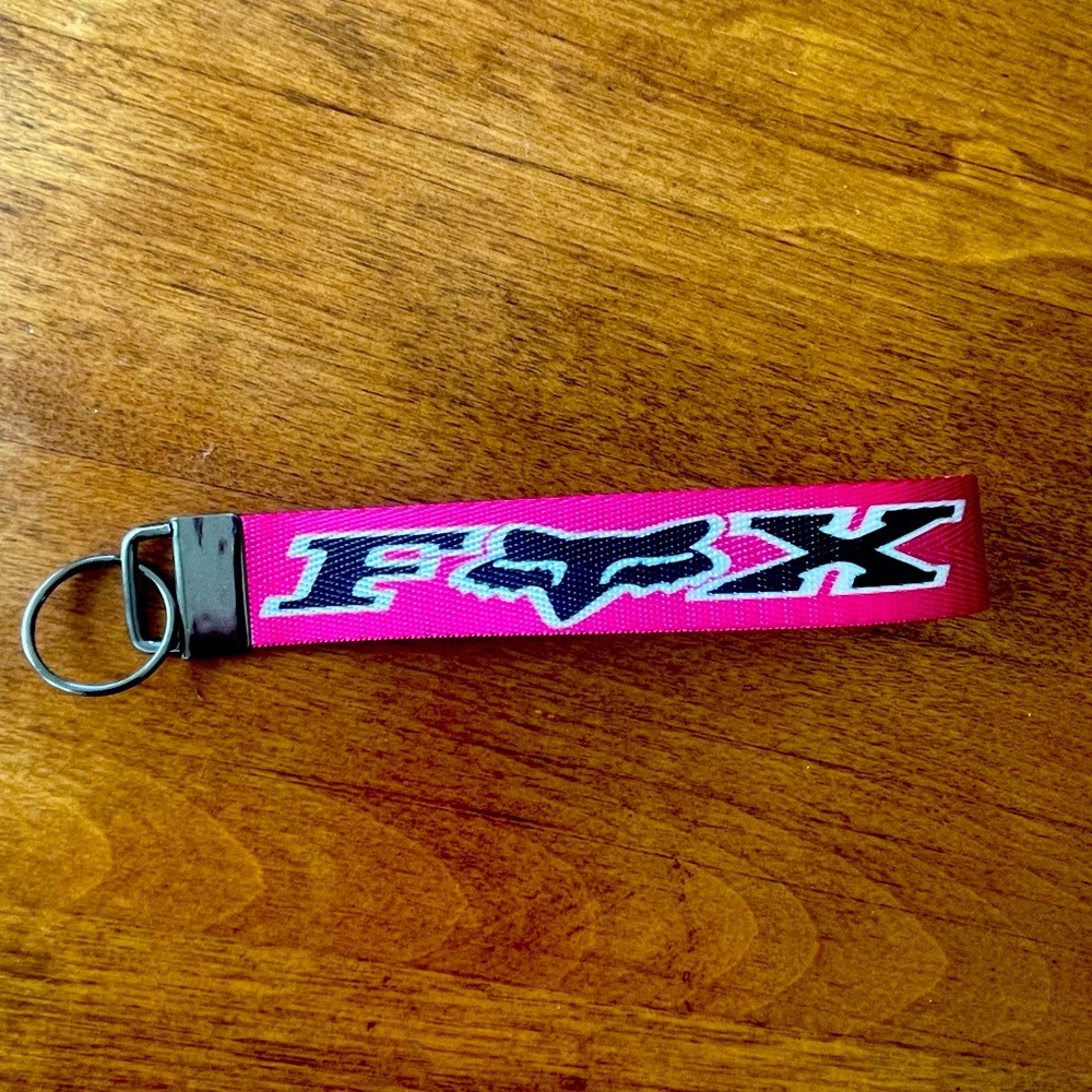 Pink and black FOX wristlet keychain